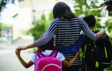 Mom Walking With Kids